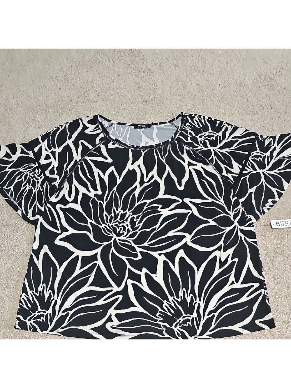 Elegant Black and White Floral Blouse